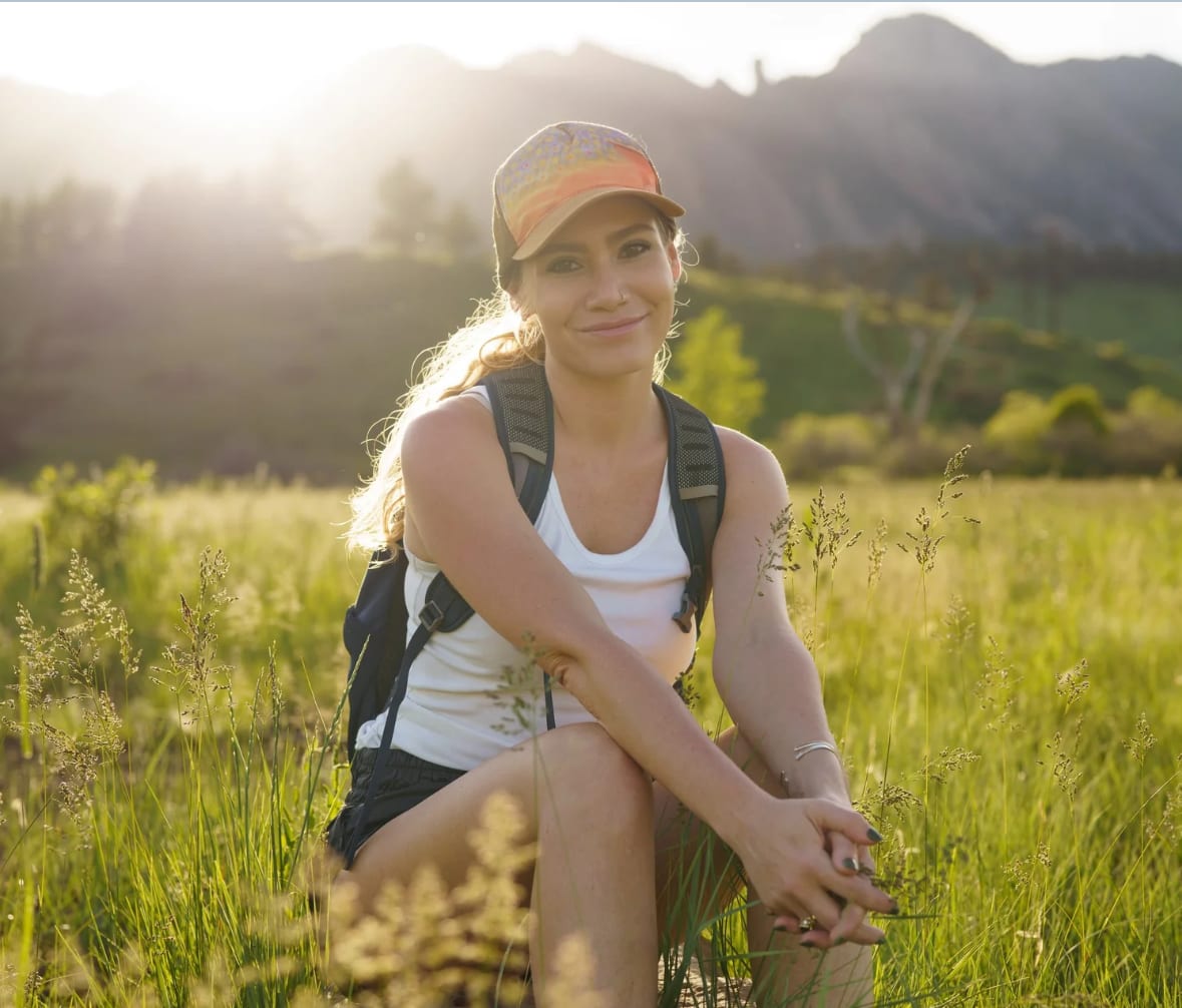 Maggie standing in a mountain meadow near Boulder