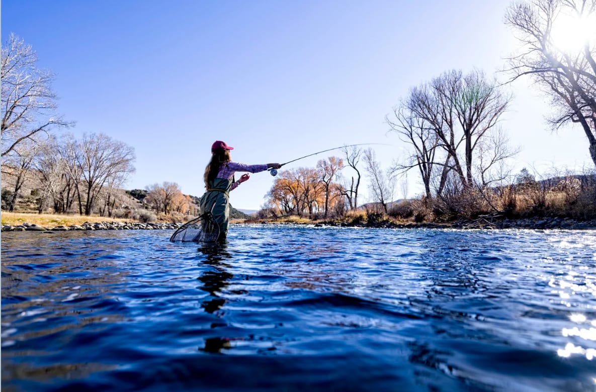 Maggie fly fishing on a Colorado river